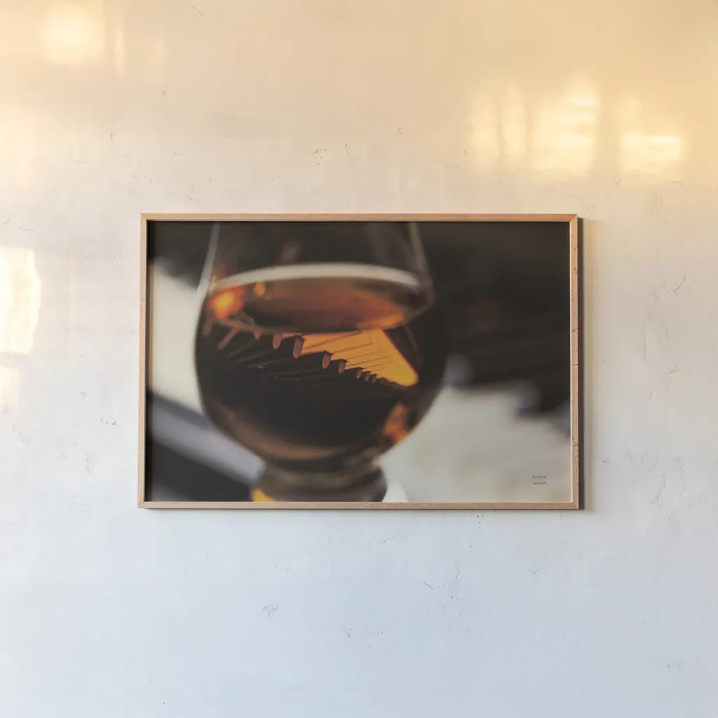 Night Vibes by Nathan Larson. shown as a paper print in a natural frame. Available as a archival giclee rolled canvas, fine art paper, or poster print. SKU 77340i.