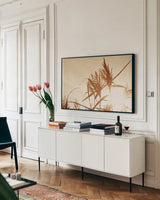 Noon Grasses IV by Nathan Larson. shown as a framed stretched canvas in a living room above a console. Available as a archival giclee rolled canvas, fine art paper, or poster print. SKU 75738i.