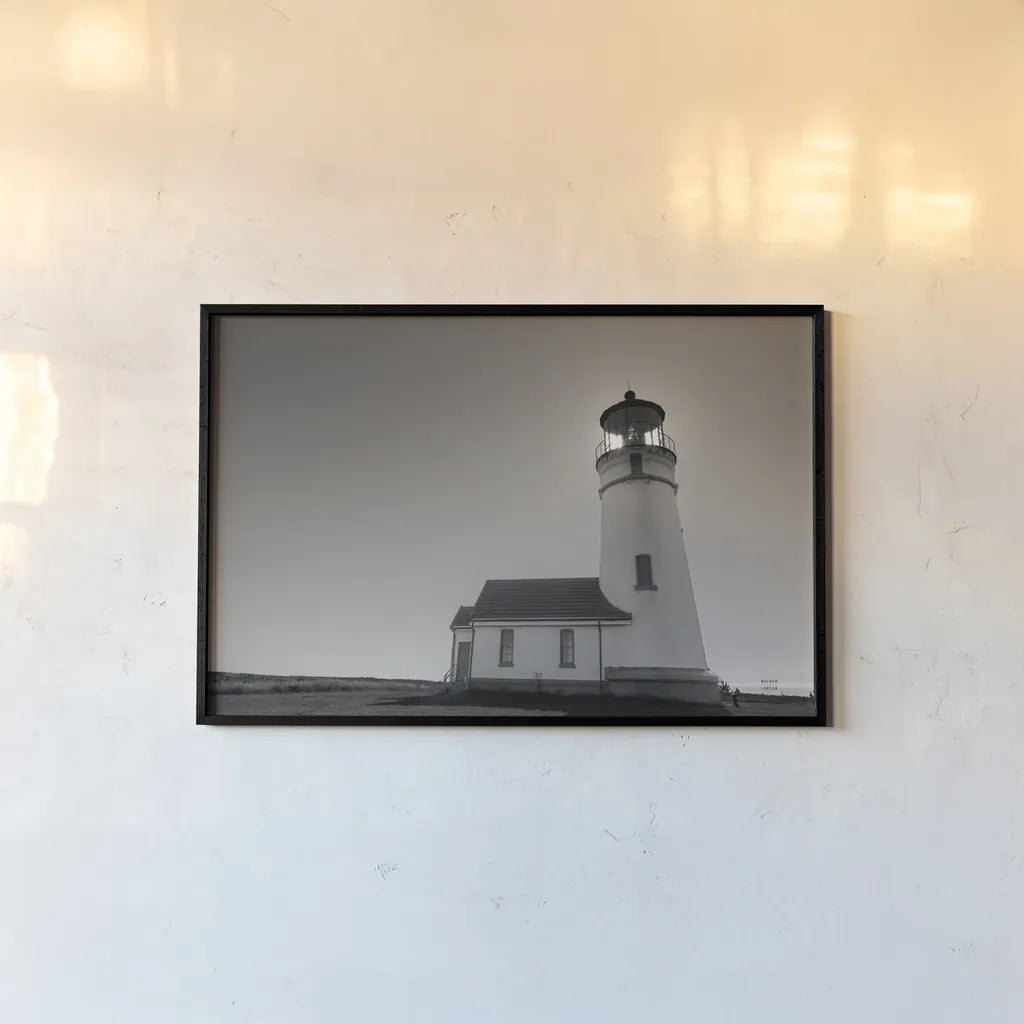 Oceanside Sunset by Nathan Larson. shown as a paper print in a black flame. Available as a archival giclee rolled canvas, fine art paper, or poster print. SKU 90173i.