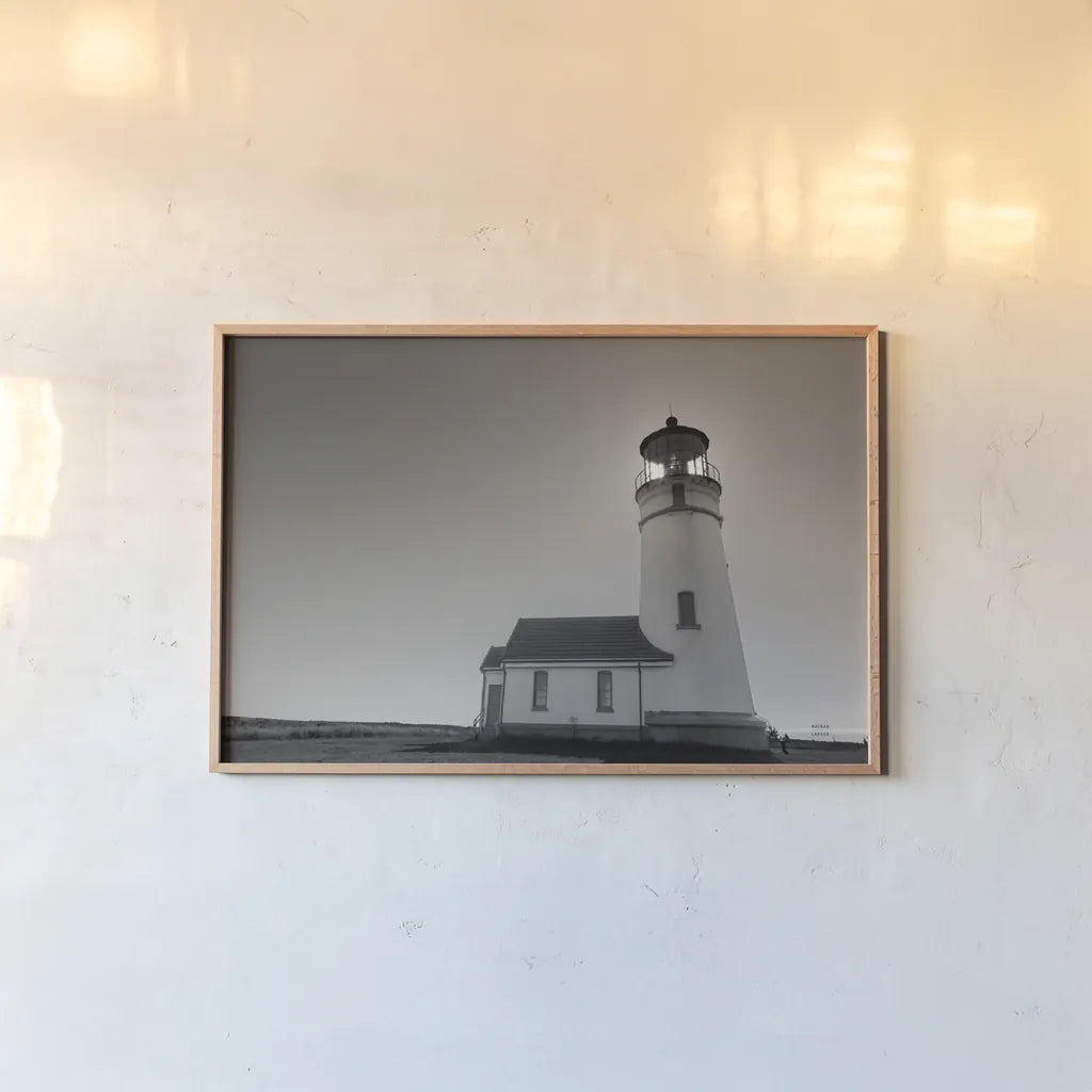 Oceanside Sunset by Nathan Larson. shown as a paper print in a natural frame. Available as a archival giclee rolled canvas, fine art paper, or poster print. SKU 90173i.