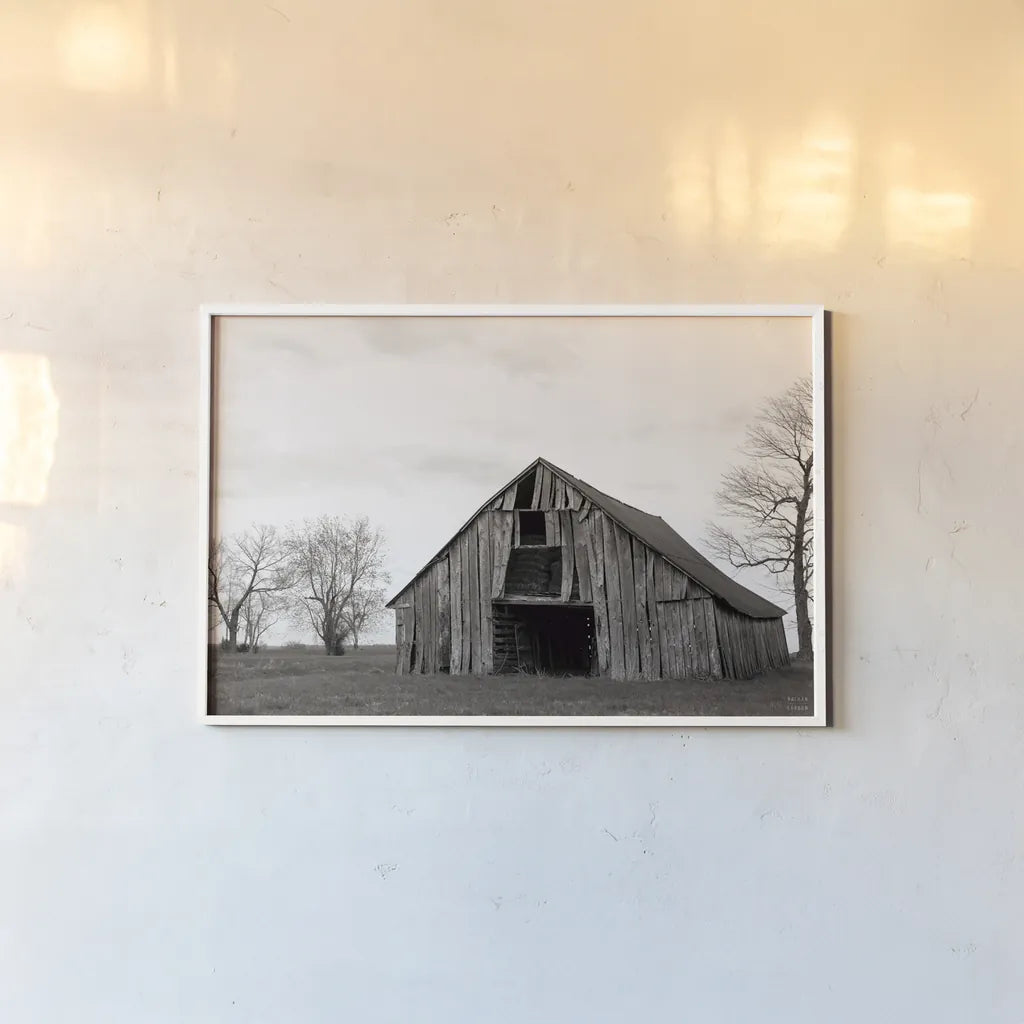 Old Hay Barn by Nathan Larson. shown as a paper print in a white frame. Available as a archival giclee rolled canvas, fine art paper, or poster print. SKU 98023i.