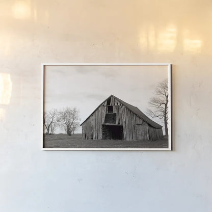Old Hay Barn by Nathan Larson. shown as a paper print in a white frame. Available as a archival giclee rolled canvas, fine art paper, or poster print. SKU 98023i.