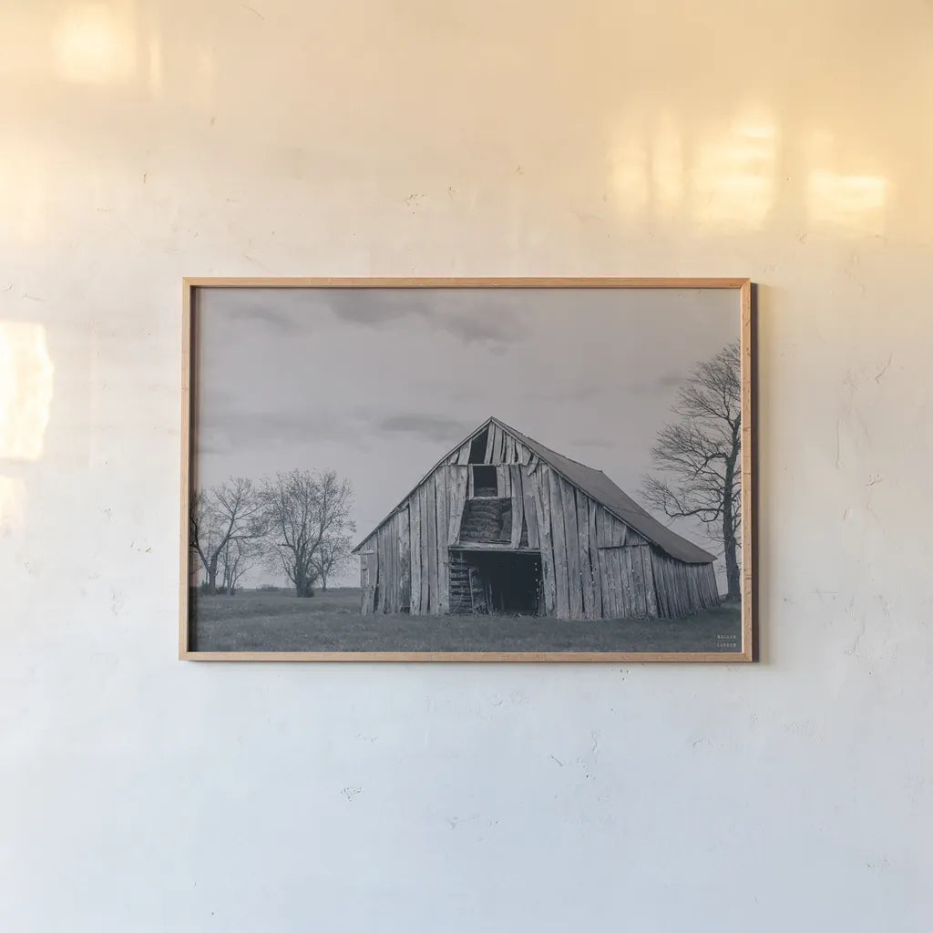 Old Hay Barn BW by Nathan Larson. shown as a paper print in a natural frame. Available as a archival giclee rolled canvas, fine art paper, or poster print. SKU 98032i.