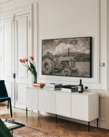 Old Puller Sepia by Nathan Larson. shown as a framed stretched canvas in a living room above a console. Available as a archival giclee rolled canvas, fine art paper, or poster print. SKU 97913i.