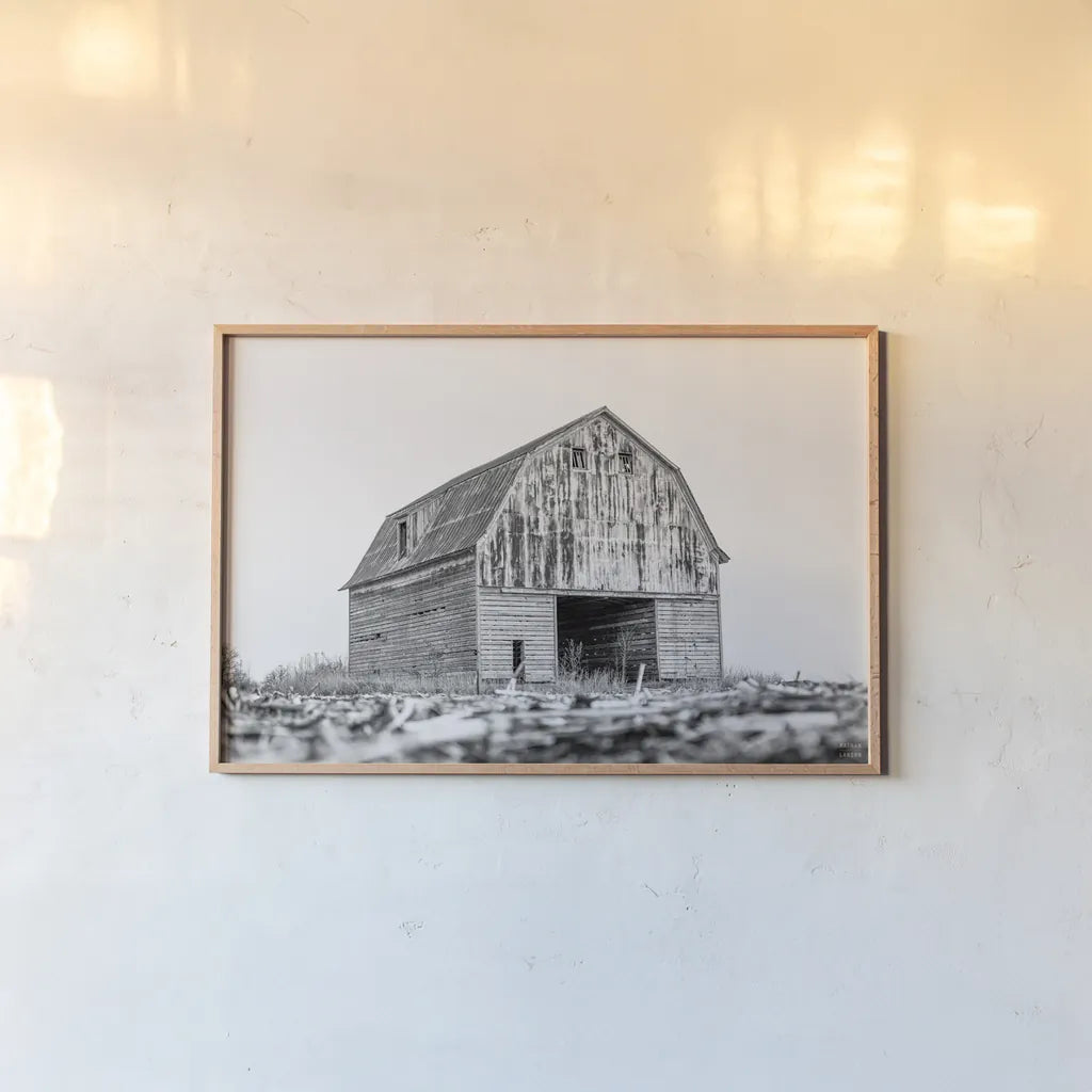 Old Route 66 Barn by Nathan Larson. shown as a paper print in a natural frame. Available as a archival giclee rolled canvas, fine art paper, or poster print. SKU 98510i.
