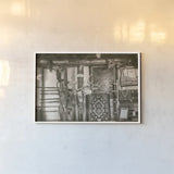 Old Trading Post by Nathan Larson. shown as a paper print in a white frame. Available as a archival giclee rolled canvas, fine art paper, or poster print. SKU 99381i.