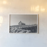 One Room Schoolhouse BW by Nathan Larson. shown as a paper print in a white frame. Available as a archival giclee rolled canvas, fine art paper, or poster print. SKU 98342i.