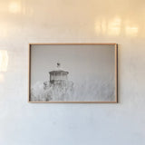 Oregon Coast Lighthouse Neutral by Nathan Larson. shown as a paper print in a natural frame. Available as a archival giclee rolled canvas, fine art paper, or poster print. SKU 86919i.
