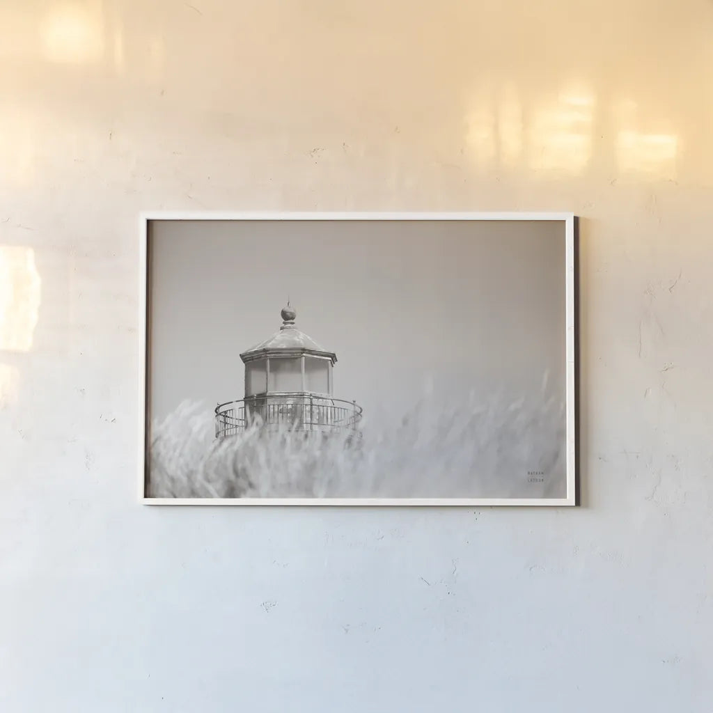Oregon Coast Lighthouse Neutral by Nathan Larson. shown as a paper print in a white frame. Available as a archival giclee rolled canvas, fine art paper, or poster print. SKU 86919i.