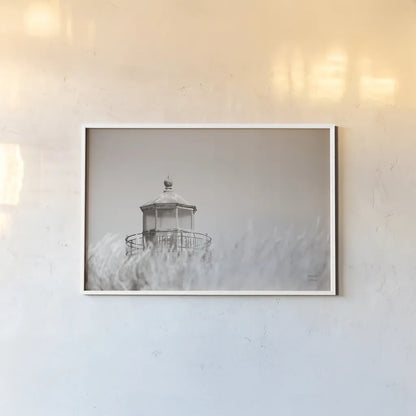 Oregon Coast Lighthouse Neutral by Nathan Larson. shown as a paper print in a white frame. Available as a archival giclee rolled canvas, fine art paper, or poster print. SKU 86919i.