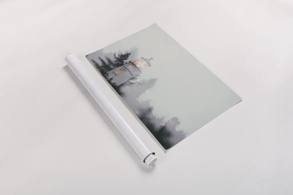 Oregon Coast Umpqua River Lighthouse by Nathan Larson. shown as a rolled paper print. Available as archival giclee rolled canvas, fine art paper, or poster print. SKU 87004i.