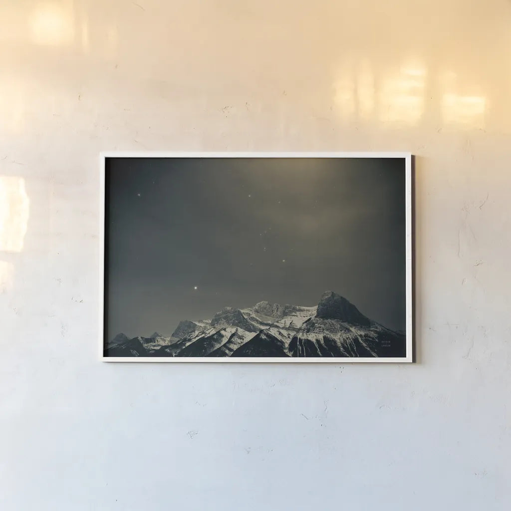 Orion by Nathan Larson. shown as a paper print in a white frame. Available as a archival giclee rolled canvas, fine art paper, or poster print. SKU 84322i.