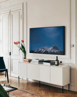 Orion Bright by Nathan Larson. shown as a framed stretched canvas in a living room above a console. Available as a archival giclee rolled canvas, fine art paper, or poster print. SKU 84324i.