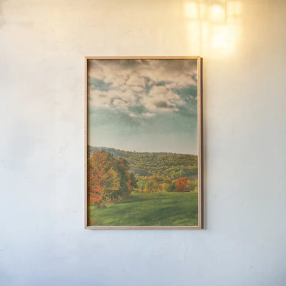 Over the Pasture by Nathan Larson. shown as a paper print in a natural frame. Available as a archival giclee rolled canvas, fine art paper, or poster print. SKU 101671h.