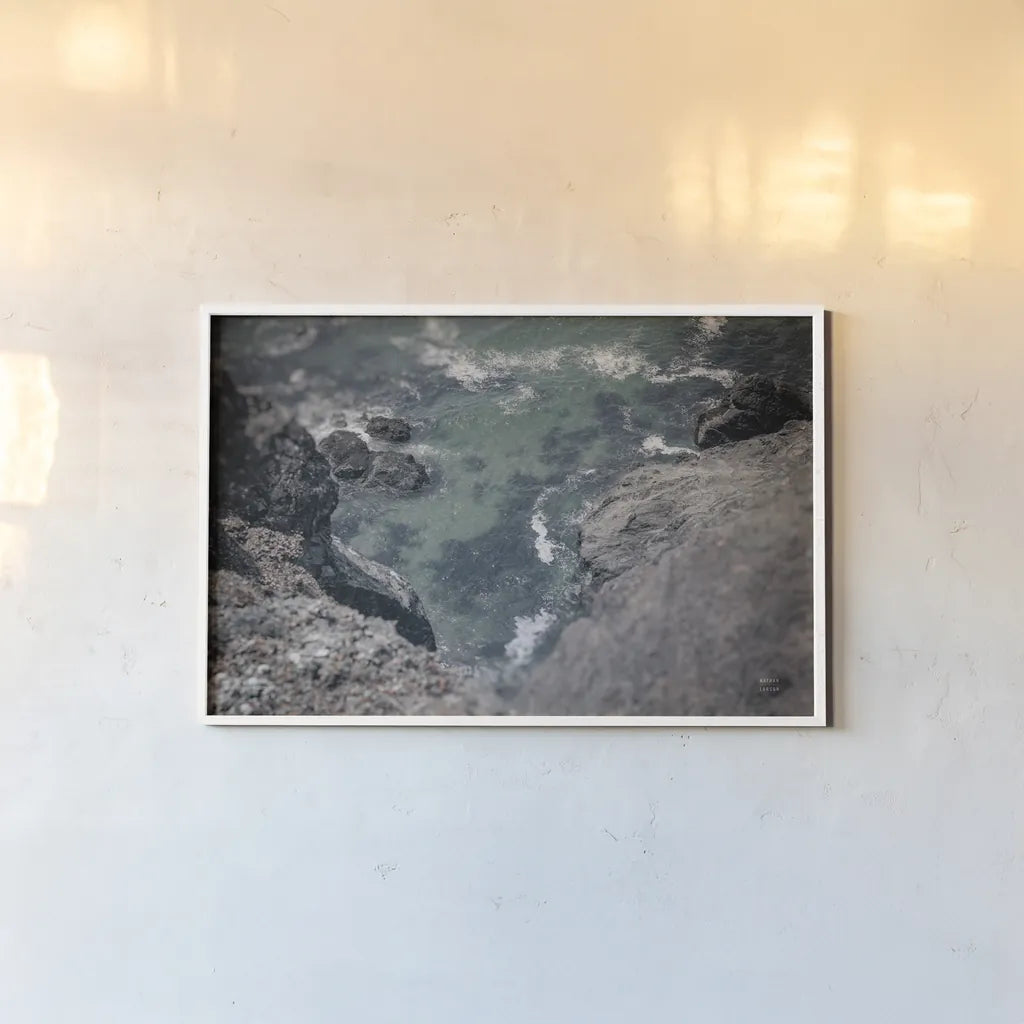 Pacific Cove by Nathan Larson. shown as a paper print in a white frame. Available as a archival giclee rolled canvas, fine art paper, or poster print. SKU 90445i.
