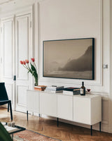 Pacific Ocean Lost by Nathan Larson. shown as a framed stretched canvas in a living room above a console. Available as a archival giclee rolled canvas, fine art paper, or poster print. SKU 92599i.