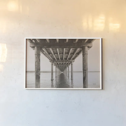 Pacific Pier by Nathan Larson. shown as a paper print in a white frame. Available as a archival giclee rolled canvas, fine art paper, or poster print. SKU 86918i.