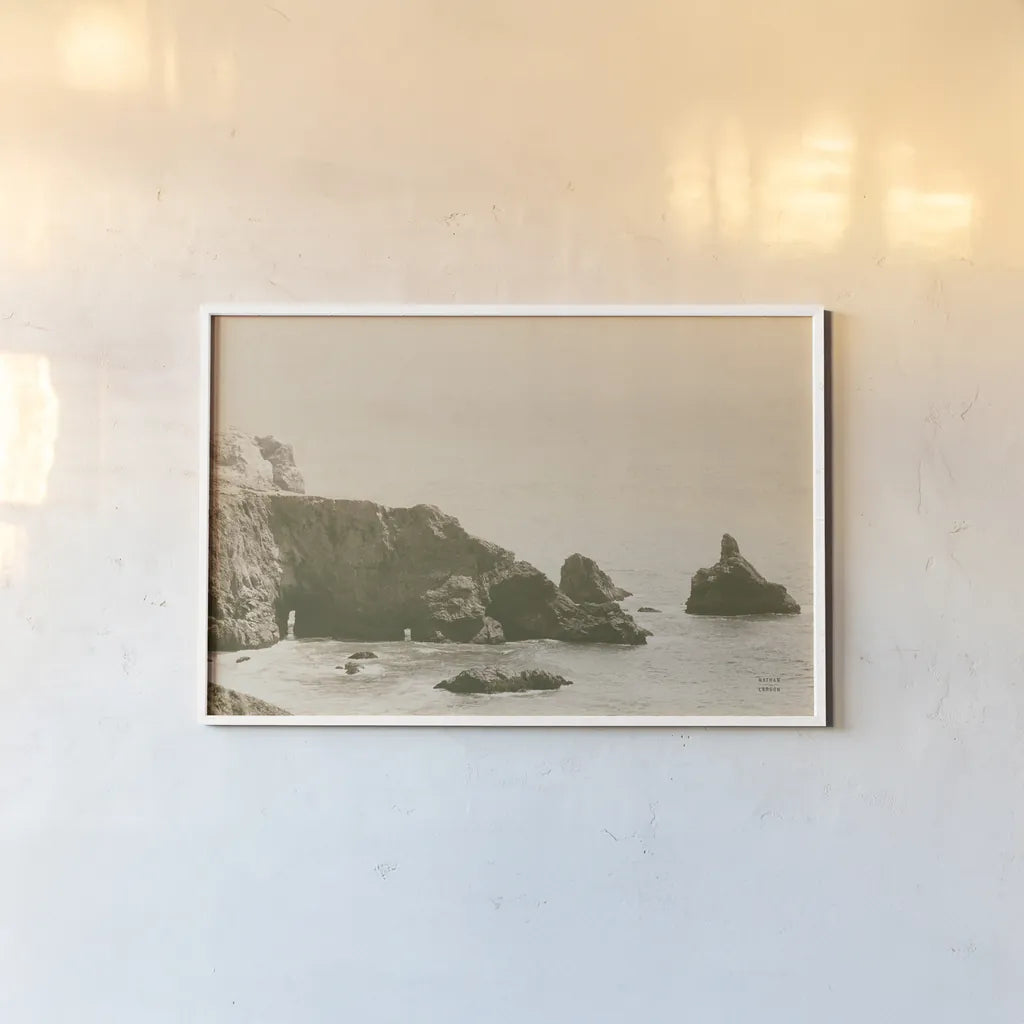 Passing Through Cove Sepia by Nathan Larson. shown as a paper print in a white frame. Available as a archival giclee rolled canvas, fine art paper, or poster print. SKU 88486i.