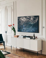 Peacock Study II Horizontal by Nathan Larson. shown as a framed stretched canvas in a living room above a console. Available as a archival giclee rolled canvas, fine art paper, or poster print. SKU 89941i.