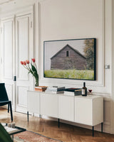 Peanut Farm by Nathan Larson. shown as a framed stretched canvas in a living room above a console. Available as a archival giclee rolled canvas, fine art paper, or poster print. SKU 98024i.