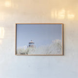 Peering Over by Nathan Larson. shown as a paper print in a natural frame. Available as a archival giclee rolled canvas, fine art paper, or poster print. SKU 87191i.