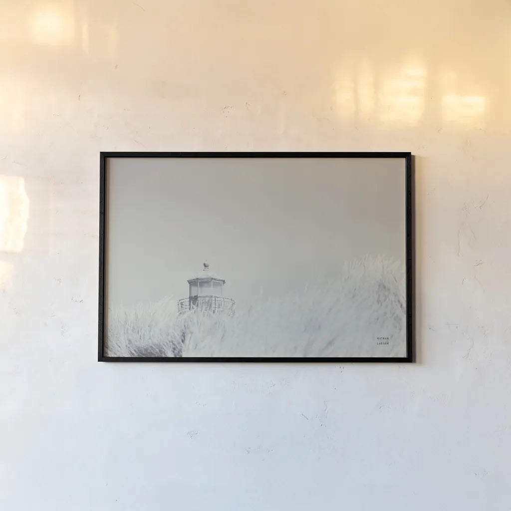Peering Over BW by Nathan Larson. shown as a paper print in a black flame. Available as a archival giclee rolled canvas, fine art paper, or poster print. SKU 87192i.