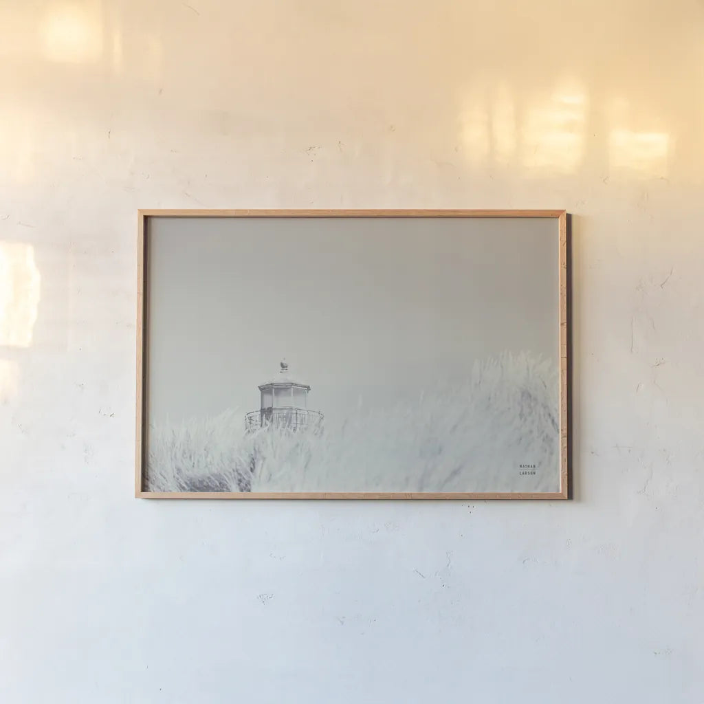 Peering Over BW by Nathan Larson. shown as a paper print in a natural frame. Available as a archival giclee rolled canvas, fine art paper, or poster print. SKU 87192i.