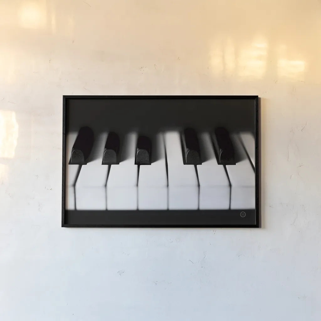 Piano Lounge I by Nathan Larson. shown as a paper print in a black flame. Available as a archival giclee rolled canvas, fine art paper, or poster print. SKU 76310i.