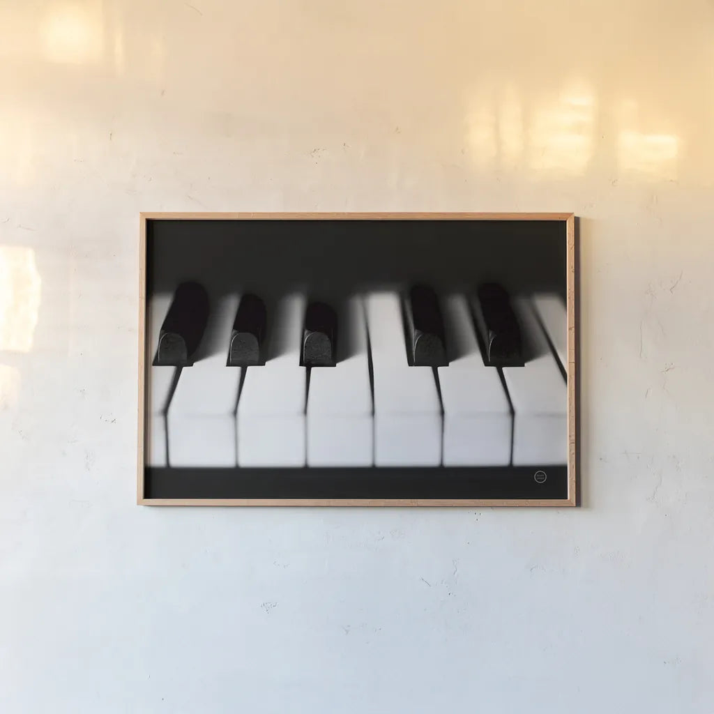 Piano Lounge I by Nathan Larson. shown as a paper print in a natural frame. Available as a archival giclee rolled canvas, fine art paper, or poster print. SKU 76310i.