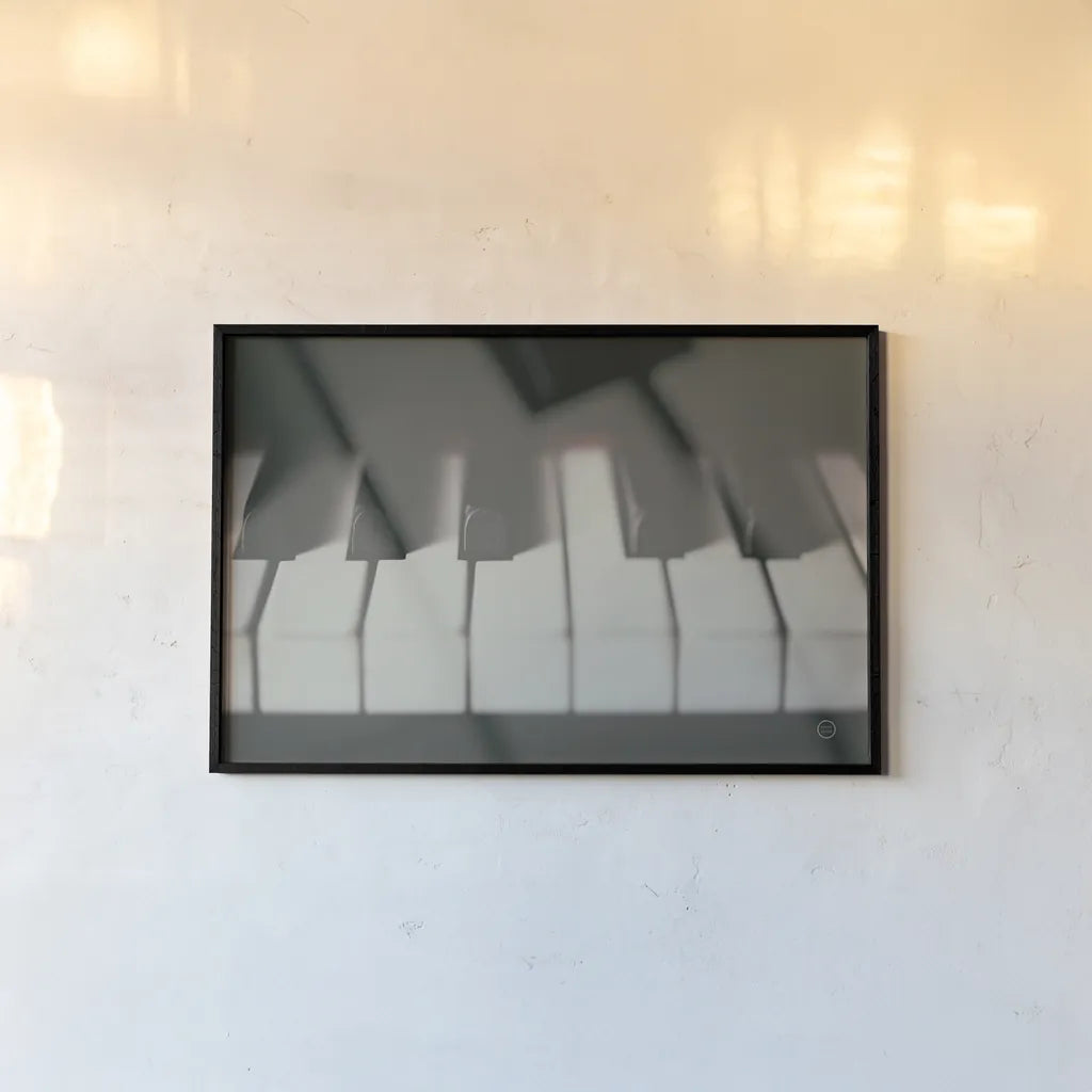 Piano Lounge III by Nathan Larson. shown as a paper print in a black flame. Available as a archival giclee rolled canvas, fine art paper, or poster print. SKU 76312i.