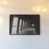 Pier Angles I by Nathan Larson. shown as a paper print in a black flame. Available as a archival giclee rolled canvas, fine art paper, or poster print. SKU 97449i.
