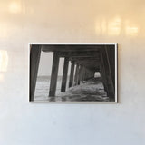 Pier Angles I by Nathan Larson. shown as a paper print in a white frame. Available as a archival giclee rolled canvas, fine art paper, or poster print. SKU 97449i.