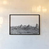 Pinnacle Sunset by Nathan Larson. shown as a paper print in a black flame. Available as a archival giclee rolled canvas, fine art paper, or poster print. SKU 88886i.