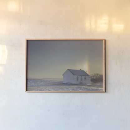 Prairie Church Solo Halo by Nathan Larson. shown as a paper print in a natural frame. Available as a archival giclee rolled canvas, fine art paper, or poster print. SKU 84239i.