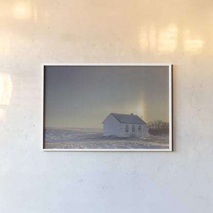 Prairie Church Solo Halo by Nathan Larson. shown as a paper print in a white frame. Available as a archival giclee rolled canvas, fine art paper, or poster print. SKU 84239i.