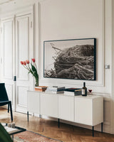 Preparing II by Nathan Larson. shown as a framed stretched canvas in a living room above a console. Available as a archival giclee rolled canvas, fine art paper, or poster print. SKU 99782i.