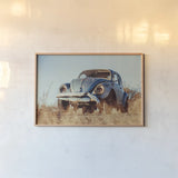 Punch Buggy by Nathan Larson. shown as a paper print in a natural frame. Available as a archival giclee rolled canvas, fine art paper, or poster print. SKU 103999i.