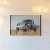 Punch Buggy by Nathan Larson. shown as a paper print in a white frame. Available as a archival giclee rolled canvas, fine art paper, or poster print. SKU 103999i.
