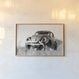 Punch Buggy BW by Nathan Larson. shown as a paper print in a natural frame. Available as a archival giclee rolled canvas, fine art paper, or poster print. SKU 103998i.