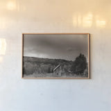 Rainbow Sunset Sepia by Nathan Larson. shown as a paper print in a natural frame. Available as a archival giclee rolled canvas, fine art paper, or poster print. SKU 86416i.