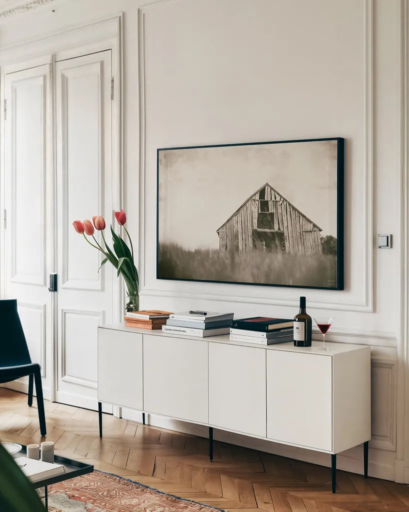 Rainy Barn Days by Nathan Larson. shown as a framed stretched canvas in a living room above a console. Available as a archival giclee rolled canvas, fine art paper, or poster print. SKU 98025i.