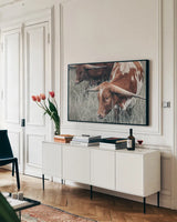 Rainy Pasture III by Nathan Larson. shown as a framed stretched canvas in a living room above a console. Available as a archival giclee rolled canvas, fine art paper, or poster print. SKU 99209i.