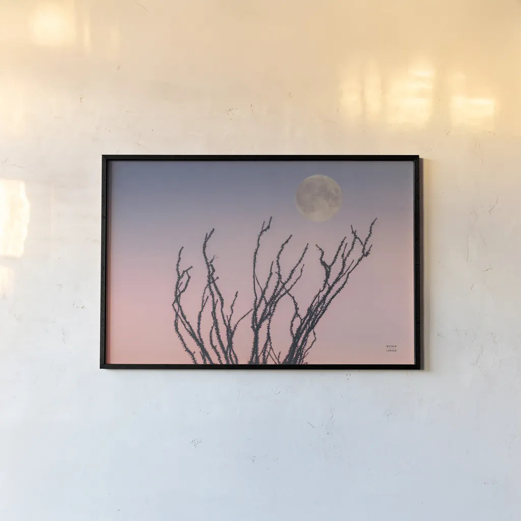 Reaching Up Moon by Nathan Larson. shown as a paper print in a black flame. Available as a archival giclee rolled canvas, fine art paper, or poster print. SKU 76442i.