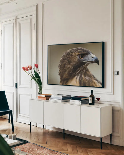 Red Tailed Hawk Profile by Nathan Larson. shown as a framed stretched canvas in a living room above a console. Available as a archival giclee rolled canvas, fine art paper, or poster print. SKU 71174i.