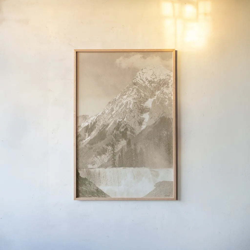 Remember the Mountain by Nathan Larson. shown as a paper print in a natural frame. Available as a archival giclee rolled canvas, fine art paper, or poster print. SKU 84247h.