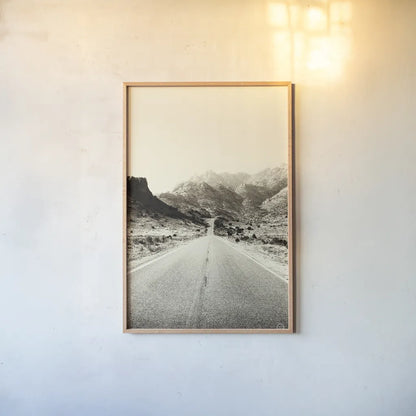 Road to Old West by Nathan Larson. shown as a paper print in a natural frame. Available as a archival giclee rolled canvas, fine art paper, or poster print. SKU 72028h.