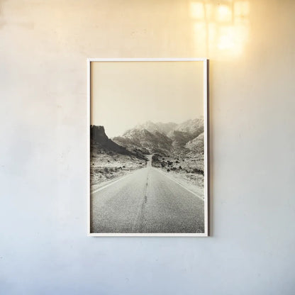 Road to Old West by Nathan Larson. shown as a paper print in a white frame. Available as a archival giclee rolled canvas, fine art paper, or poster print. SKU 72028h.
