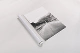 Road to Old West BW by Nathan Larson. shown as a rolled paper print. Available as archival giclee rolled canvas, fine art paper, or poster print. SKU 72754h.