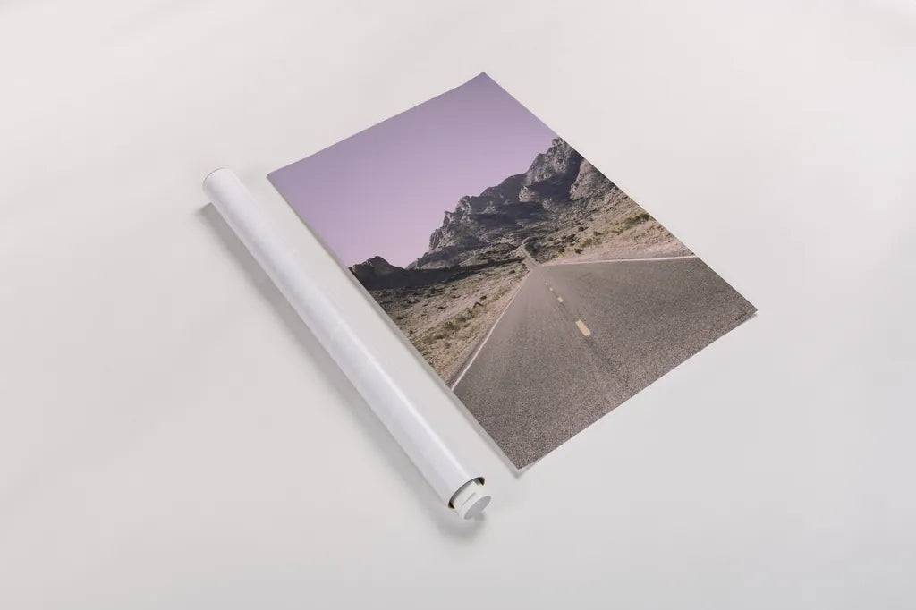 Road to Old West Purple by Nathan Larson. shown as a rolled paper print. Available as archival giclee rolled canvas, fine art paper, or poster print. SKU 79243h.