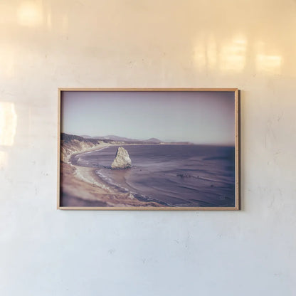 Rock Coast by Nathan Larson. shown as a paper print in a natural frame. Available as a archival giclee rolled canvas, fine art paper, or poster print. SKU 90184i.